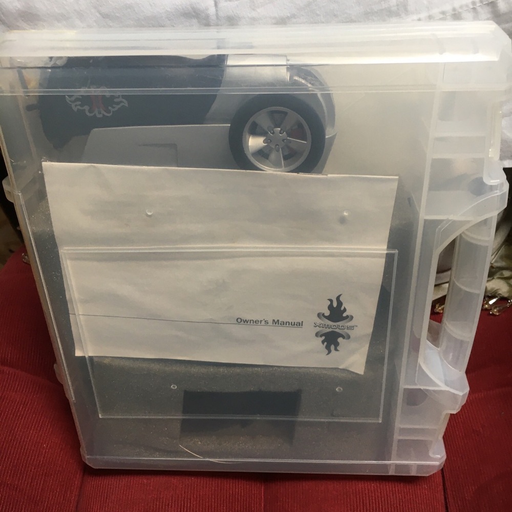 First Generation Xmods remote control car in carrying case